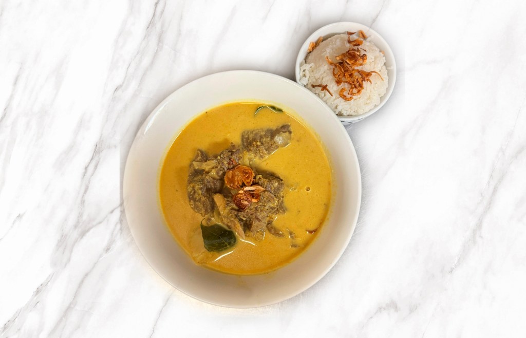 59. Gulai kambing – Goat Lamb Curry —&nbsp;$25